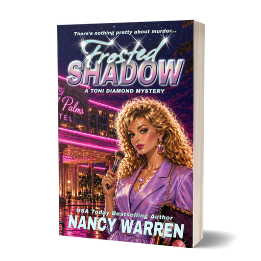 Book cover of 'Frosted Shadow' by Nancy Warren with a woman holding a gun in front of a neon-lit hotel.