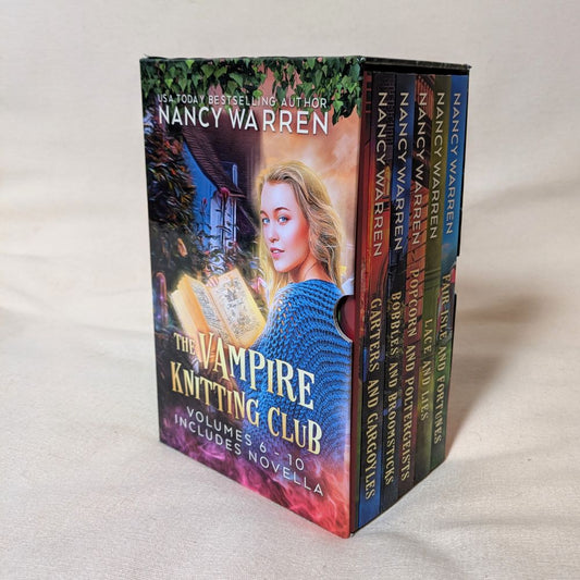 Set of books titled 'The Vampire Knitting Club' by Nancy Warren on a light background