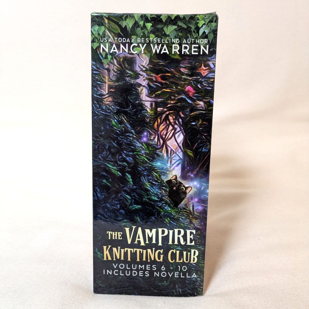 Book titled 'The Vampire Knitting Club' by Nancy Warren on a white background