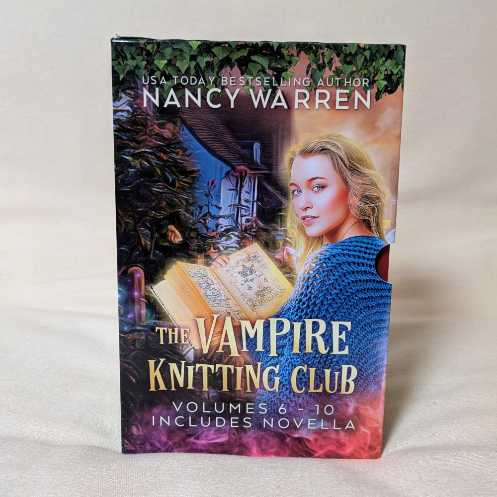 Book titled 'The Vampire Knitting Club' by Nancy Warren on a light background