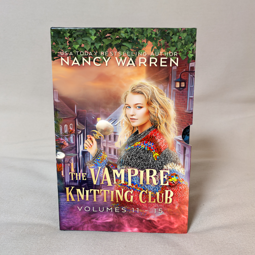 Book titled 'The Vampire Knitting Club Volumes 11-15' by Nancy Warren on a gray background