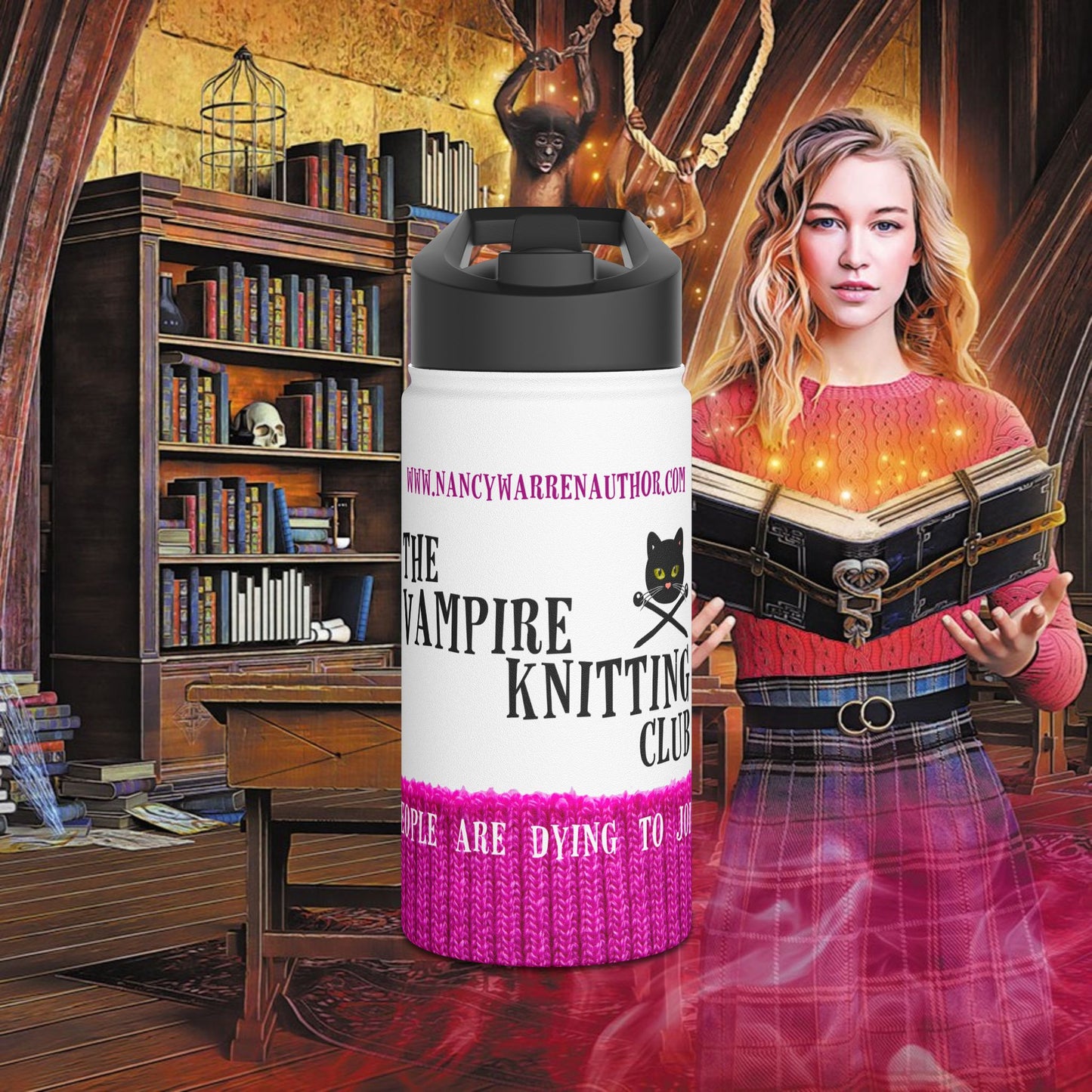 A white insulated tumbler with a black lid and a pink-and-white printed design reading 'The Vampire Knitting Club' is centered in front of a fantasy bookshelf scene. A woman holding glowing books appears on the right, and the background is a dark, warmly lit library interior.